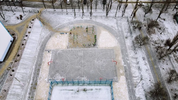 stock image Snow basketball pitch. Basketball field top view in the winter filming on drone