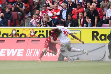 KOELN, GERMANY - 23 Nisan 2022: Futbol maçı Bundesliga Koln - Arminia