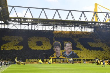 DORTMUND, GERMANY - MAY 14 2022: Fans performance. The match of Bundesliga Borussia Dortmund vs Hertha Berlin at Signal Iduna Park
