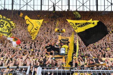 DORTMUND, GERMANY - MAY 14 2022: Marcel Schmelzer AND FANS. The match of Bundesliga Borussia Dortmund vs Herta Berlin at Signal Iduna Park clipart