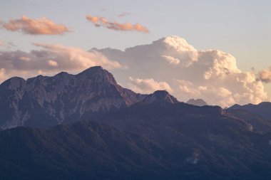 A panoramic view on the Alps. Outdoor activity. Alpine mountain chains in the back