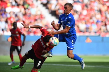 Leverkusen, Germany - August 20, 2022: Dennis Geiger vs Piero Hincapie. The match of Bundesliga FC Bayer 04 Leverkusen vs TSG 1899 Hoffenheim
