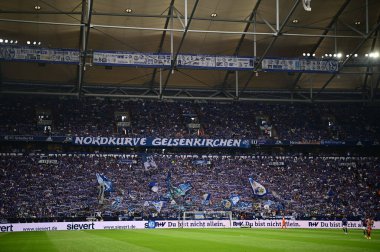 GELSENKIRCHEN,  GERMANY - AUGUST 27, 2022: Supporters of Schalke 04. The football match of Bundesliga FC Schalke 04 vs Union Berlin