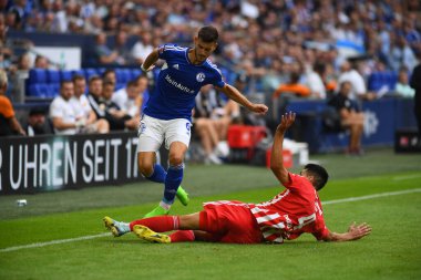 GELSENKIRCHEN,  GERMANY - AUGUST 27, 2022: Diogo Leite vs Tom Krauss. The football match of Bundesliga FC Schalke 04 vs Union Berlin