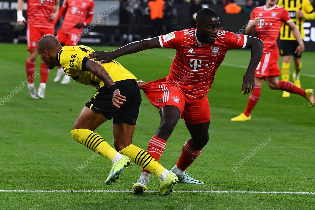 DORTMUND, GERMANY - OCTOBER 8, 2022: Donyell Malen, Dayot Upamecano, The football match of Bundesliga  Borussia Dortmund vs Bayern Munich