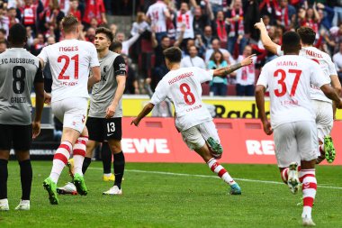 COLOGNE, ALMANY - 16 Ekim 2022: Denis Huseinbasic amacını kutluyor. Bundesliga 1 'in futbol maçı. FC Koeln, FC Augsburg 'a karşı. Rhein Enerji Stadyumu Futbol Stadyumu. 