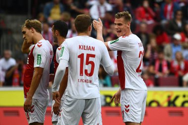 COLOGNE, Almanya - 16 Ekim 2022: Steffen Tigges, Luca Kilian. Bundesliga 1 'in futbol maçı. FC Koeln, FC Augsburg 'a karşı. Rhein Enerji Stadyumu Futbol Stadyumu. 