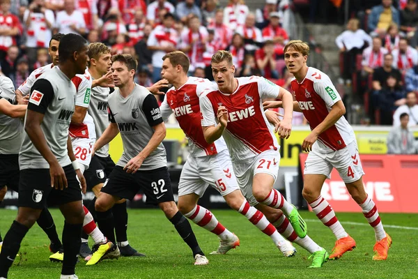 COLOGNE, Almanya - 16 Ekim 2022: Steffen Tigges, Raphael Framberger, Luca Kilian, Timo Huebers. Bundesliga 1 'in futbol maçı. FC Koeln, FC Augsburg 'a karşı. Rhein Enerji Stadyumu Futbol Stadyumu. 