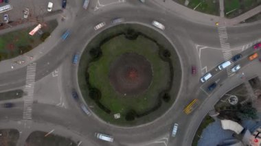 4k aerial view timelapse of roundabout road with circular cars.