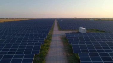 Aerial HDR view of solar panels stand in a row in the fields power ecology innovation nature environment green energy ecology innovation environment solar farm..