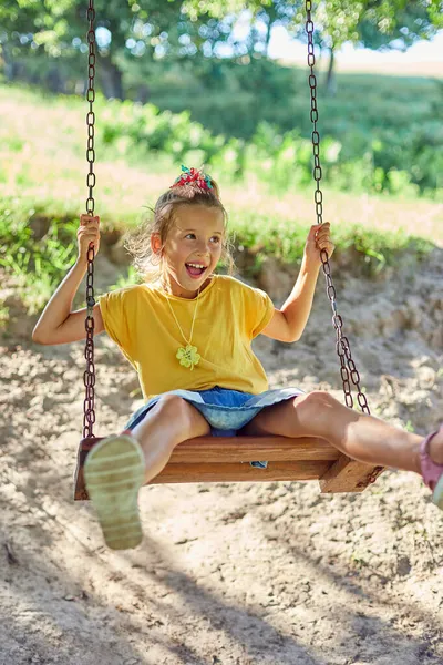 Similing Little Girl Swinging Large Rustic Wooden Swing Park Sunlight — Stock Photo, Image