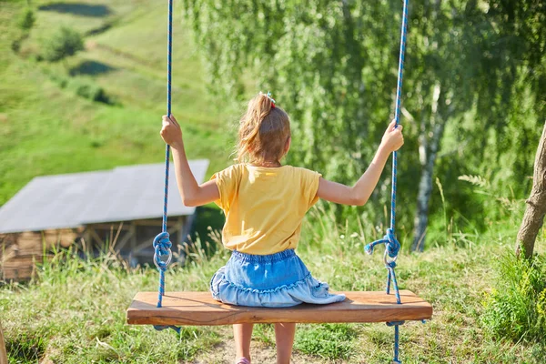 Similing Little Girl Swinging Large Rustic Wooden Swing Park Sunlight — Stock Photo, Image