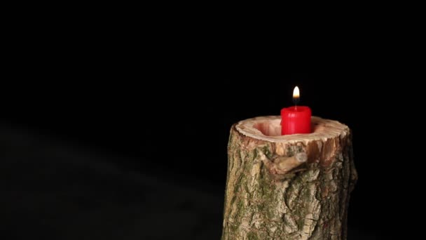 Man Hand Set Fire Candle Wooden Candlestick Black Background Red — Stock Video