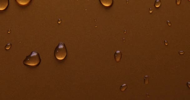 Abstrakt Vatten Droppar Guld Brons Bakgrund Makro Bubblor Närbild Kosmetiska — Stockvideo