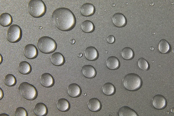 抽象的な水は灰色の銀の背景 マクロ 泡が閉じます 化粧品液滴 フラットレイパターン — ストック写真