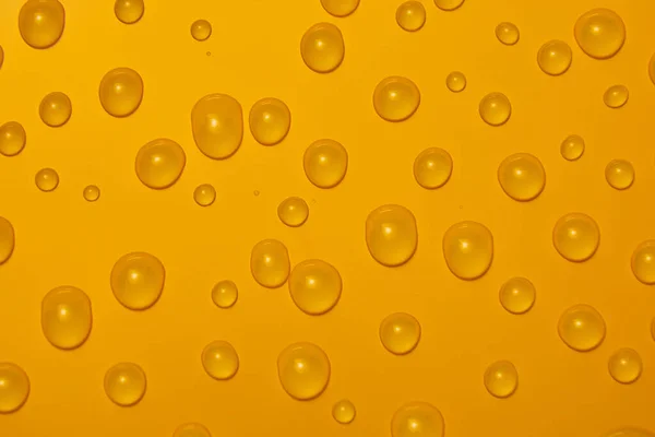 Abstrakte Wassertropfen Auf Orangefarbenem Bronzehintergrund Makro Blasen Nahaufnahme Kosmetische Feuchtigkeitsspendende — Stockfoto