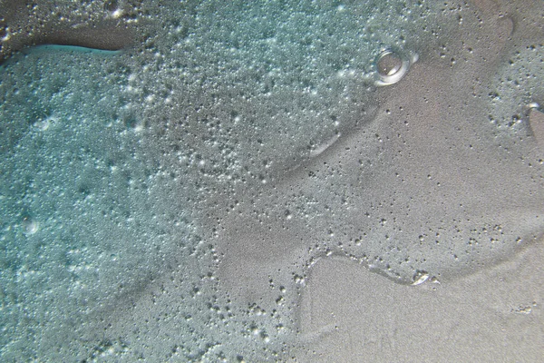 Gümüş doku, makyaj ve kozmetik arka plan, cilt bakımı veya saç ürünü üzerine mavi krem sıvı jel serumu