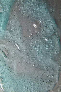 Gümüş doku, makyaj ve kozmetik arka plan, cilt bakımı veya saç ürünü üzerine mavi krem sıvı jel serumu