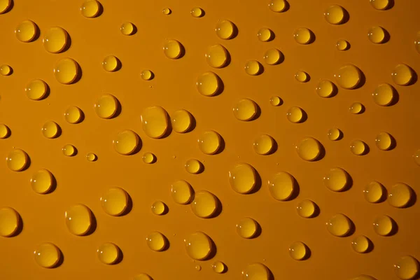 Abstrato Gotas Água Fundo Bronze Laranja Macro Bolhas Perto Cosmético — Fotografia de Stock