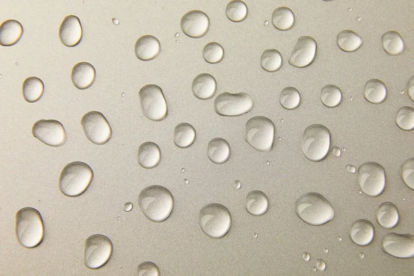 Abstrakte Wassertropfen Auf Grauem Silbergrund Makro Blasen Nahaufnahme Kosmetische Flüssigkeitstropfen — Stockfoto
