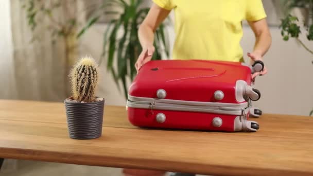 Woman Close Zips Red Suitcase Packing Getting Ready Summer Vacation — Video