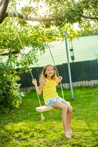 Happy Barefoot Laughing Child Girl Swinging Swing Sunset Summer Day — Stock Photo, Image