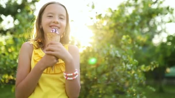Cute Girl Braces Eating Italian Ice Cream Cone Smiling While — Stockvideo