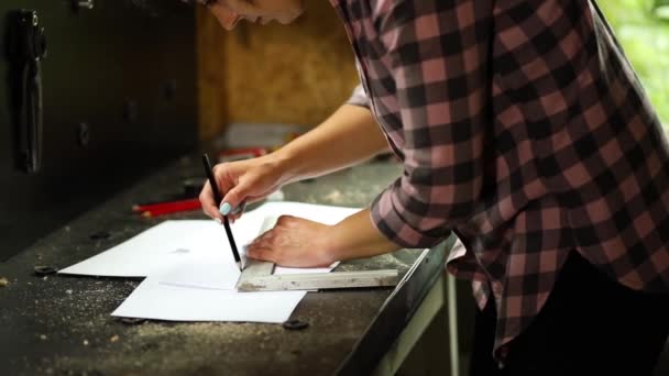 Female Interior Designer Working Drawings Woman Architect Draws Ruler Plan — Stockvideo