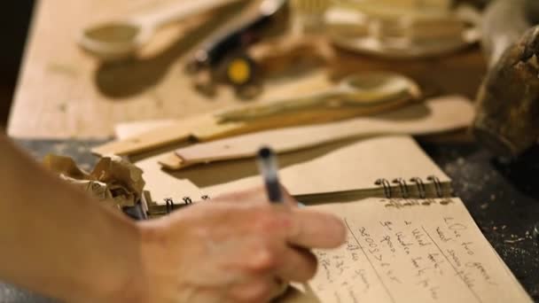 Close Carpenter Woman Hand Makes Notes Order Details Her Customer — Vídeos de Stock