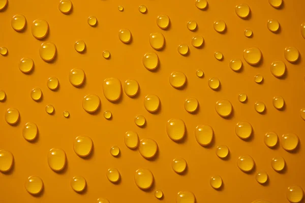 Abstrato Gotas Água Fundo Bronze Laranja Macro Bolhas Perto Cosmético — Fotografia de Stock