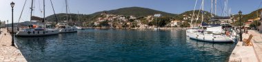 ITHACA island, GREECE-August, 2021. KIONI port in the ITHACA island, Ionian Islands, Greece in summer sunny day. Horizontal. Panoramic view.