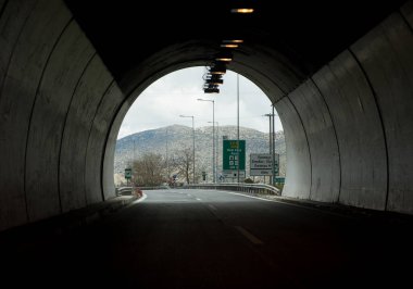Driving through the tunnel on a greek highway in the mountrains during winter season.