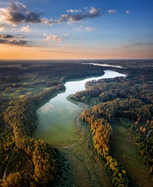 Gant Lake on polish kayak route Krutynia in sunset light, Poland