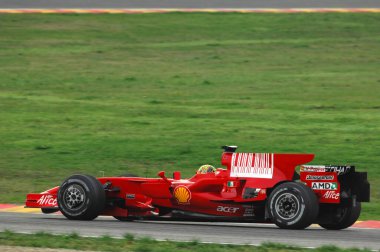Mugello pisti, 21 Kasım 2008: Valentino Rossi Ferrari F1 2008 eski Dünya Şampiyonu Kimi Raikkonen 'i İtalya' daki Mugello Pisti 'nde test etti.