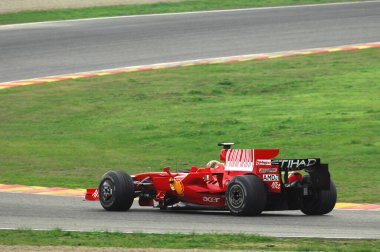 Mugello pisti, 21 Kasım 2008: Valentino Rossi Ferrari F1 2008 eski Dünya Şampiyonu Kimi Raikkonen 'i İtalya' daki Mugello Pisti 'nde test etti.