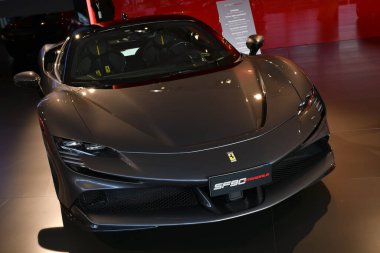 Scarperia, Mugello - 19 November 2021: Ferrari SF90 Stradale on display during Finali Mondiali Ferrari 2021 at Mugello Circuit in Italy. clipart