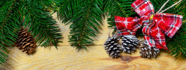 Christmas Banner Fir Tree Branch Pine Cones Decorations Wooden Background — 图库照片