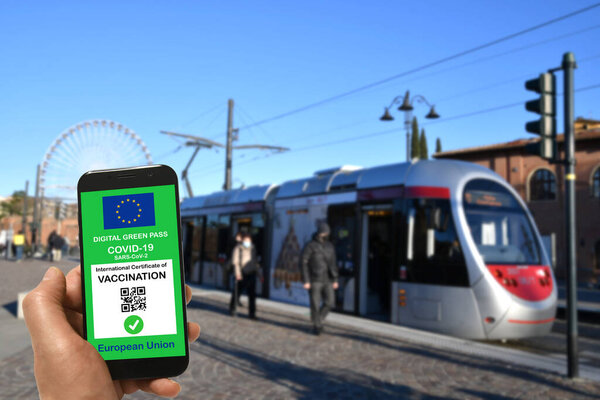 Man Tram Stop Holding Smartphone European Union Digital Green Pass — Stock Photo, Image