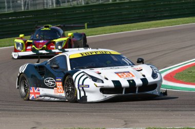 Imola, 12 May 2022: #55 Ferrari 488 GTE EVO of SPIRIT OF RACE Team driven by Griffin - Perel in action during Practice of ELMS 4H of Imola in Italy. clipart