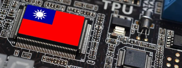 Flag of Taiwan on semiconductor chip or microchip on a motherboard. Taiwan manufacturing chip industry battle between US - China.