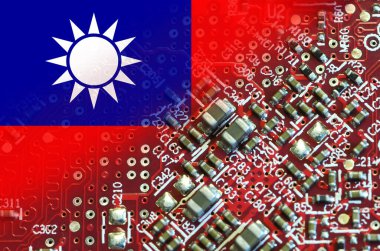 Flag of Taiwan on microchips of a electronic printed board. Taiwan manufacturing chip industry emerges as battlefront in U.S. - China showdown.