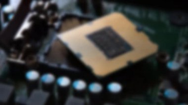 rack focusing on the computer processor on electronic motherboard. Computer motherboard with components.
