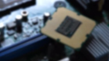 Detail of the computer processor on electronic motherboard. Computer motherboard with components.
