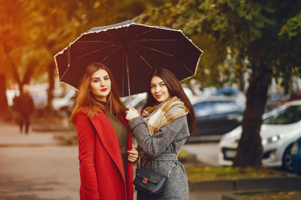 Elegant women in a autumn city — 스톡 사진