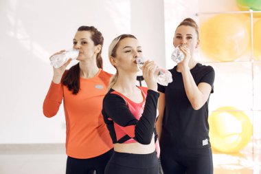 Jumping young women on a trampoline