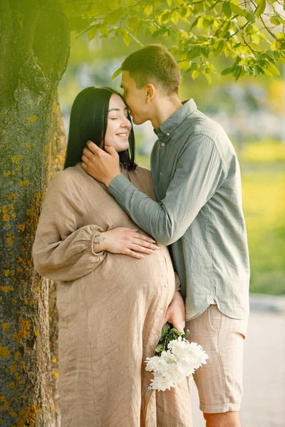 Couple Waiting First Baby Standing Grass Hugging Pregnant Woman Her — Photo