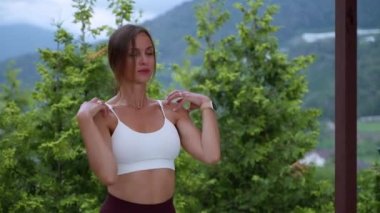 Athlete warming up with shoulder rotation exercise