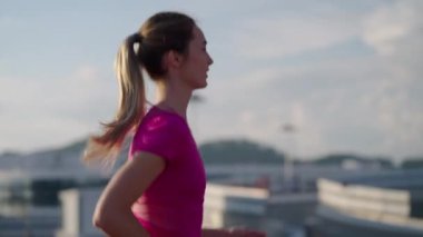 Young blonde on her every morning run