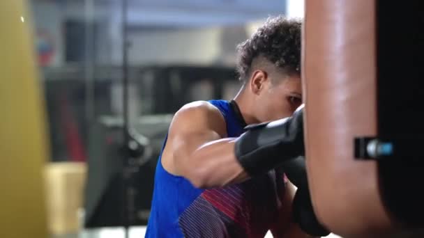 Slow Motion Shot Latino Boxer Practicing Hits Punching Stand Gym — Stock Video
