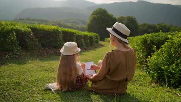 Family Time Nature Little Girl Her Mother Drawing Garden Woman — Stock Video